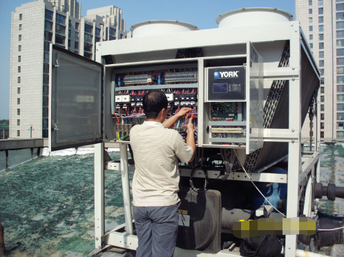 北京中央空調螺桿風冷機組的維修、調試-圖1